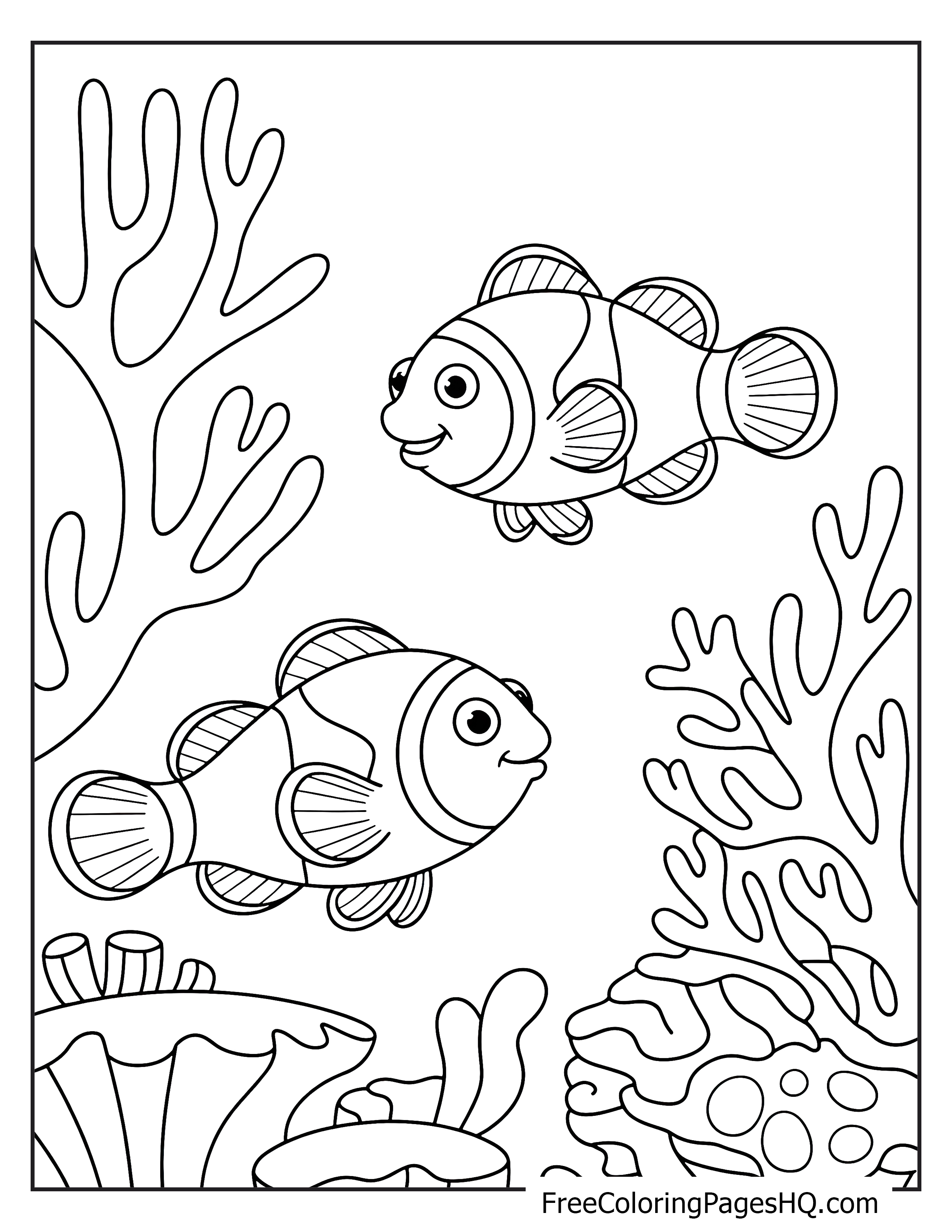 Two clownfish swimming among coral in an underwater scene.