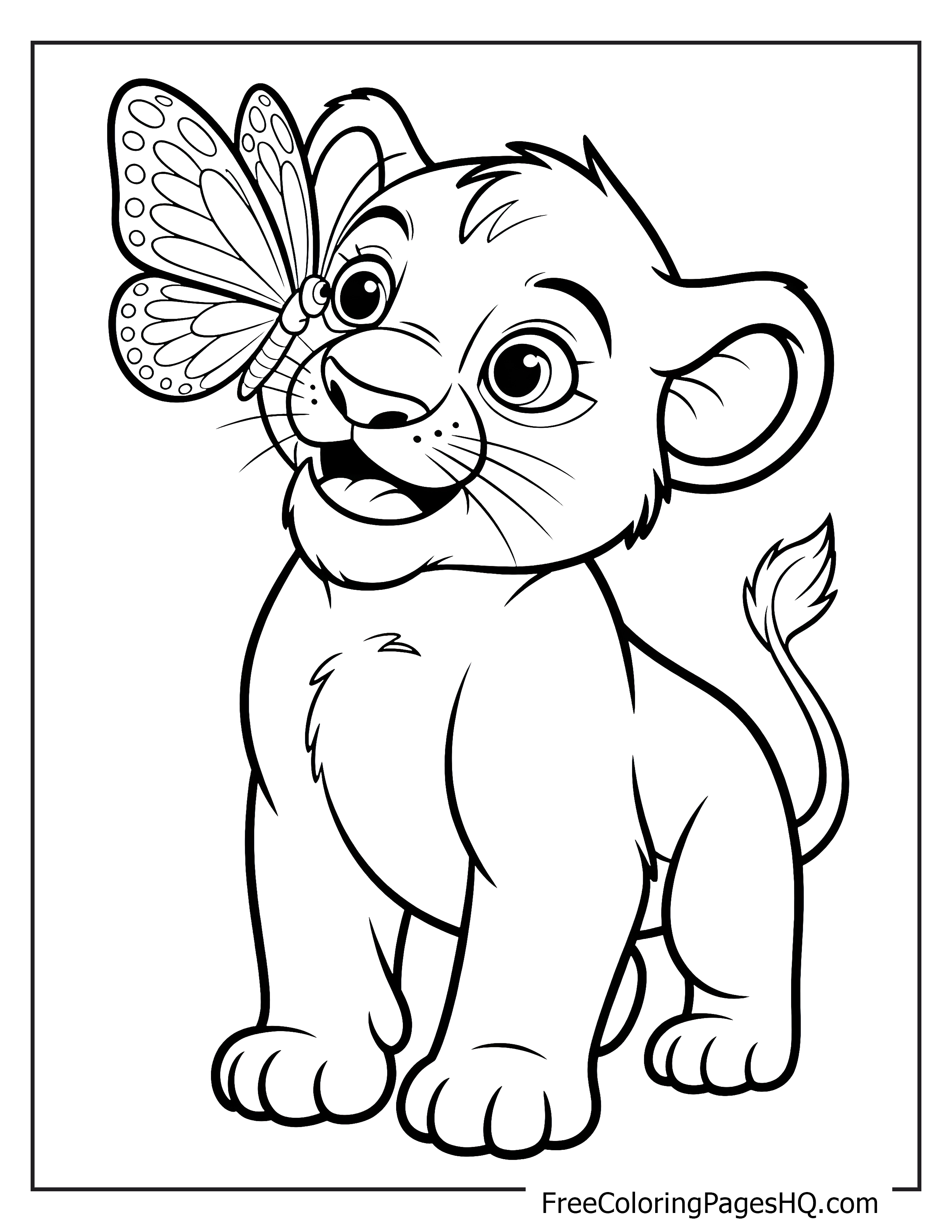 Playful lion cub looking at a butterfly on its nose.