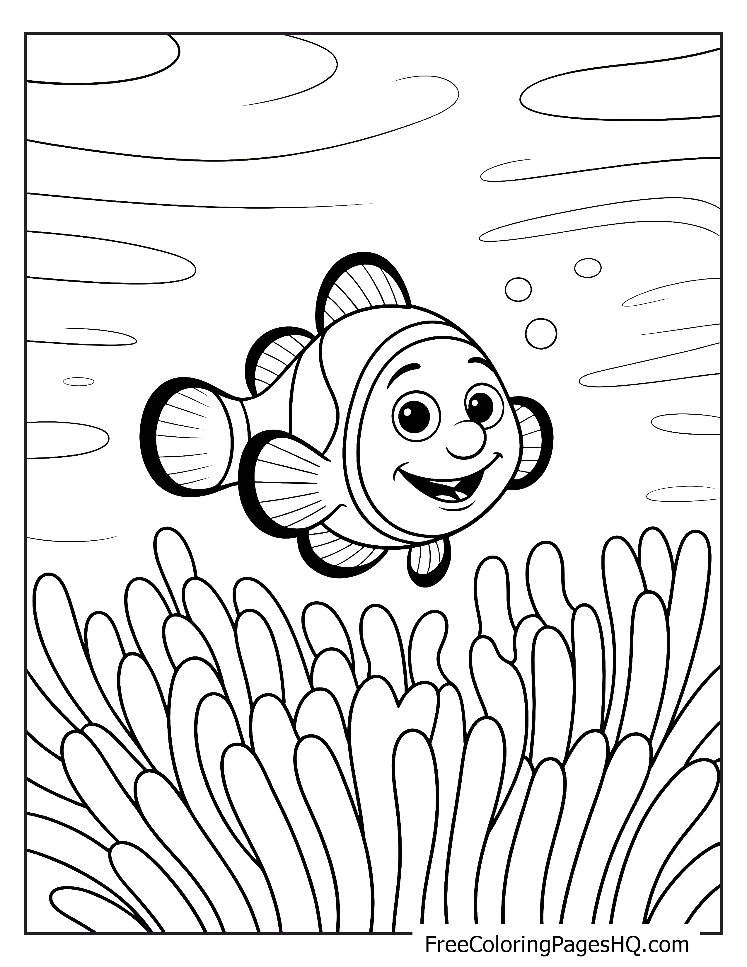 A smiling clownfish swims near sea anemones in the ocean.