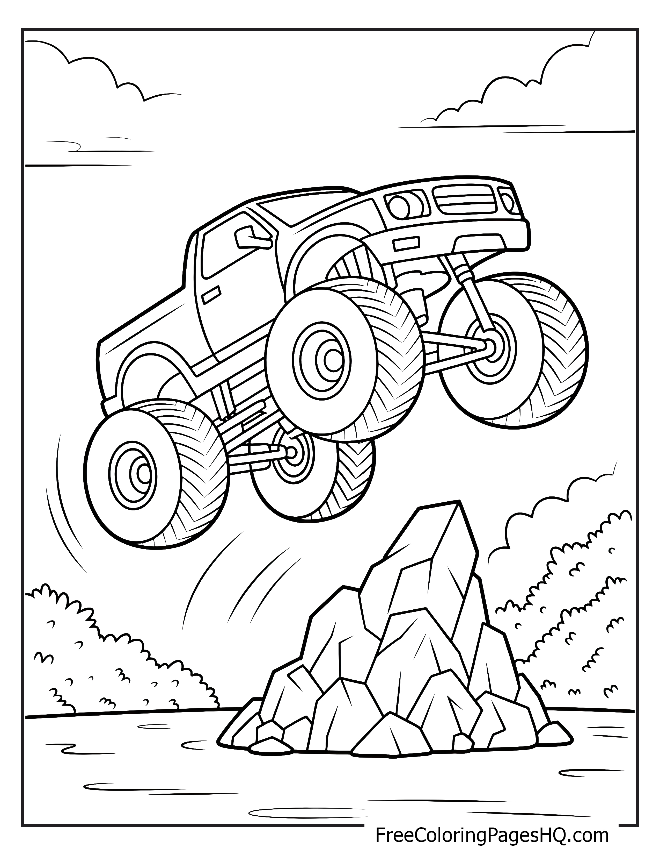 Monster truck soaring over a rock with clouds behind.