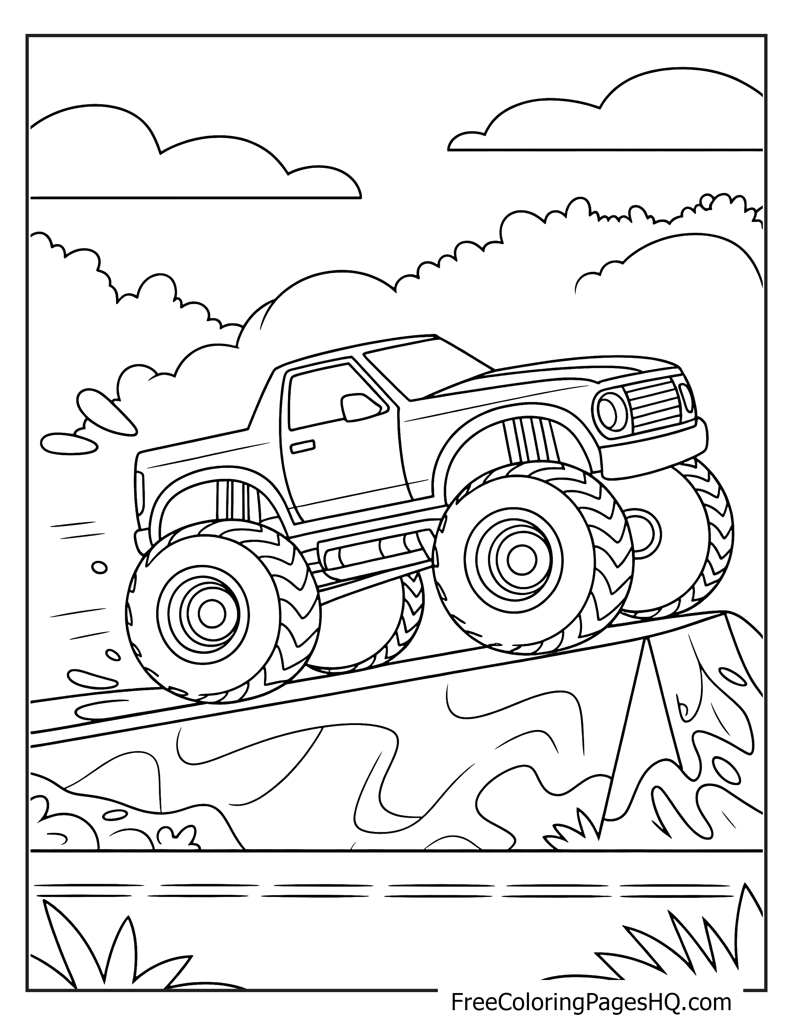 Monster truck driving up a hill with clouds above.