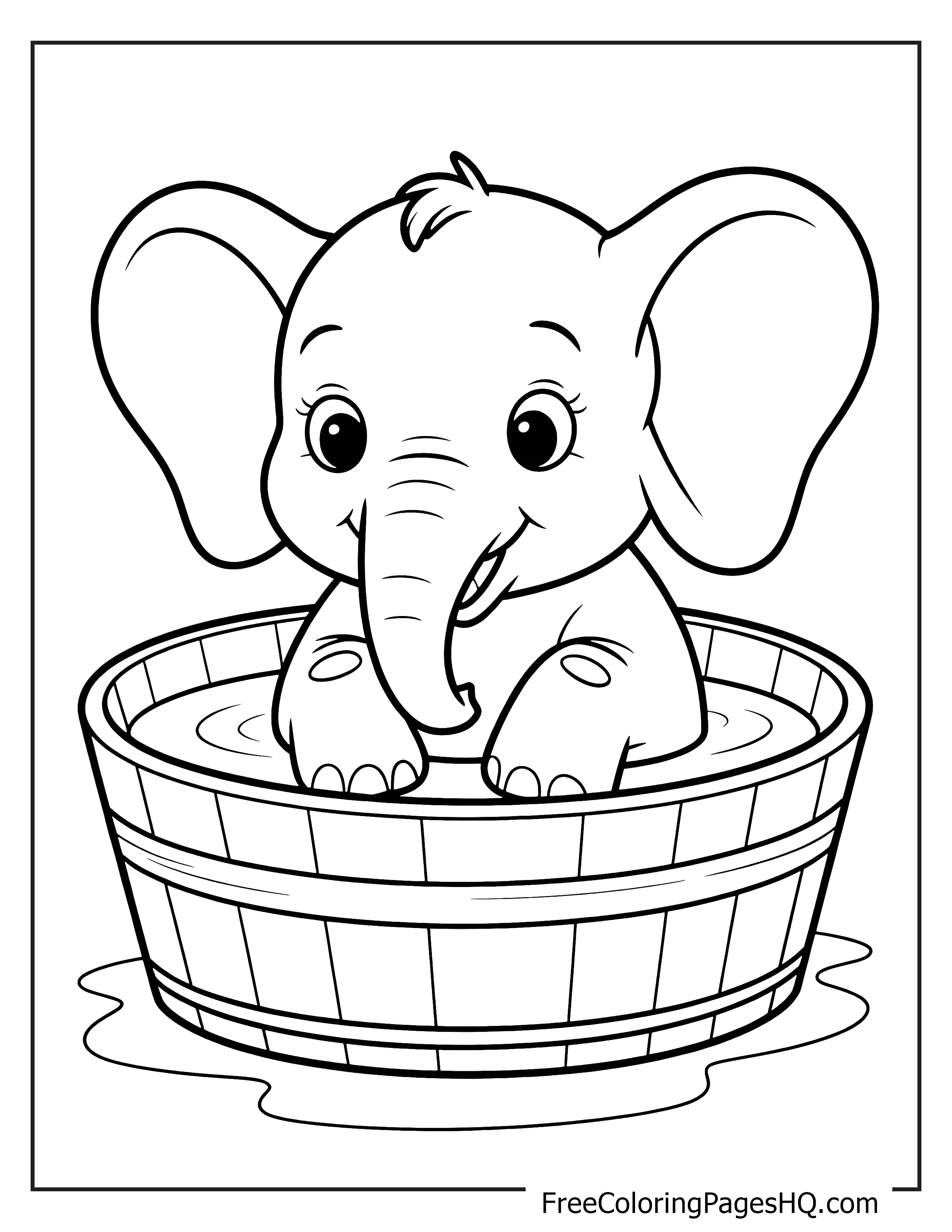 Adorable elephant enjoying a bath in a tub.