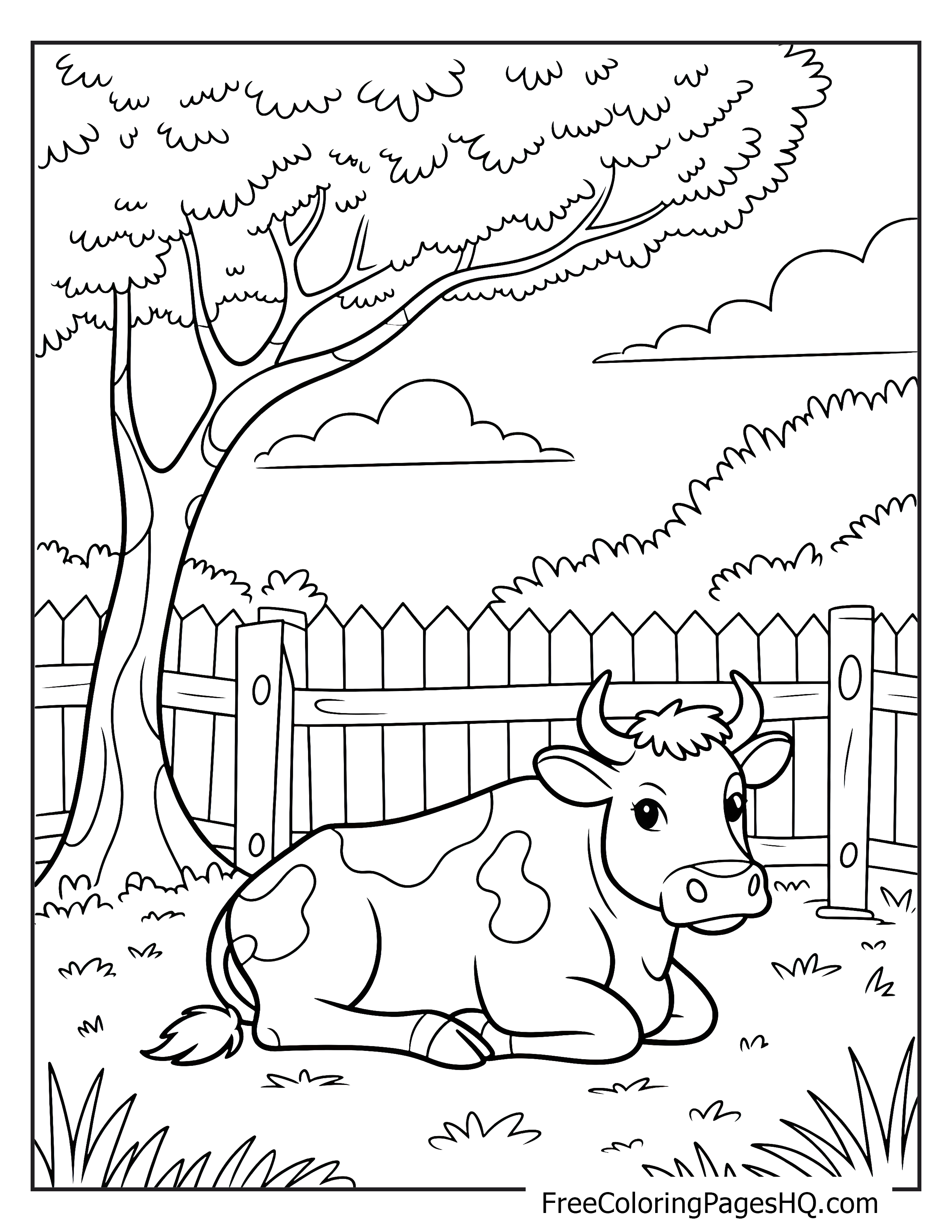 A cow lounging under a tree in a fenced field.