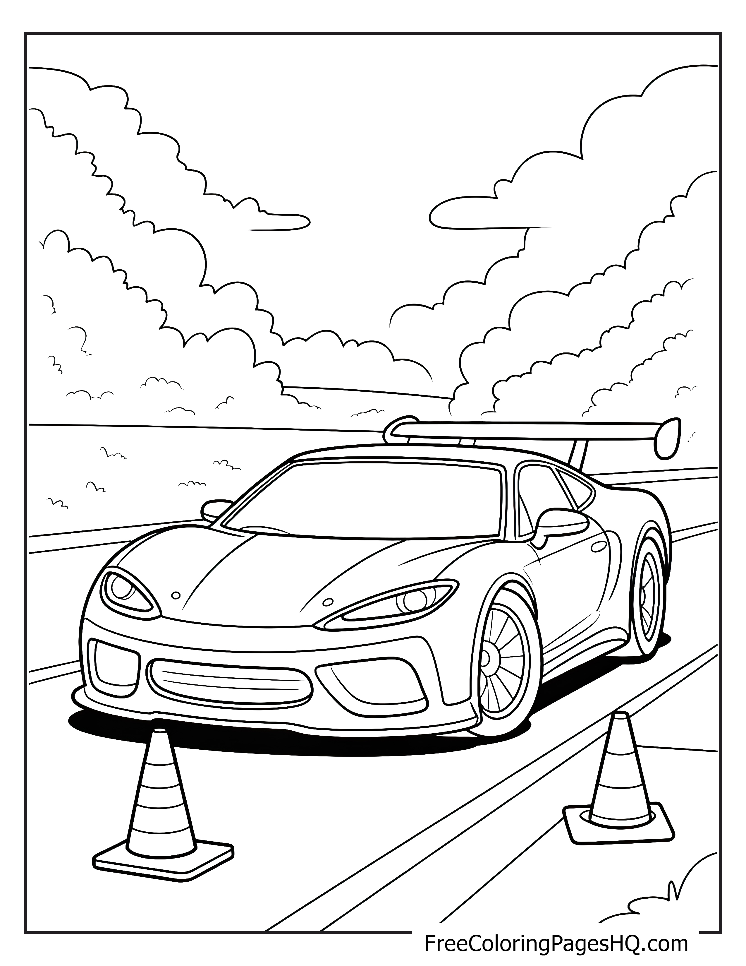 Sports car driving through cones under the clouds.